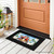 Black Bless This Home Cardinal Mini Mat with colorful cardinal design on wooden porch floor.