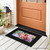 Perched Cardinals Mini Mat with colorful flowers and vibrant red birds on black background.