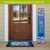 Spring Flowers Pine Reversible Porch Leaner with colorful floral design and home sweet home text.