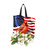 American Cardinal tote bag with USA flag design, red cardinal, and white flowers on black handles.
