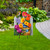 Birds and Blooms Metal Art garden decoration with vibrant flowers, butterflies, and a bird design.