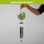 Country Birds Illuminated Wind Chime with colorful bird design and black tubes and leaf decoration.