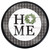 Round wooden sign with "HOME" and wreath on white and plaid background with black frame.