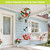Ladybugs and Daisies hot air balloon spinner with floral design and ladybugs hanging from a porch.