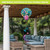 Springtime Hummingbirds Hot Air Balloon Spinner outdoor decor with colorful hummingbirds and flowers design.