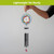 Bless This Home With Love Illuminated Wind Chime with colorful flowers and black tubes.