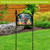 American Lemonade Acrylic Art Sign with colorful flowers and welcome text on black metal stand outdoors.