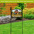 Sunflower Barn Acrylic Art Sign on black metal stand with welcome text and garden background.