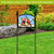 Bless This Home Cardinal Acrylic Art Sign on stand with colorful cardinal birds and garden background.