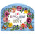 Bless This Home With Love colorful floral acrylic art sign with butterflies on a wooden background.