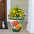 Butterflies and Daisies Large Planter with colorful flowers and butterflies design on a porch step.
