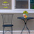 Briarwood Lane small black metal table and chair with Butterflies and Daisies planter on top.