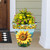 Large Sunflower Dance planter with vibrant yellow flowers and colorful design on a front porch.