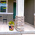 American Sunflowers Medium Planter with yellow flowers and American flag design on a front porch.