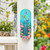 Dragonfly Garden Metal Thermometer with colorful flowers and dragonflies on a white porch post outdoors.
