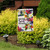 Hummingbirds and flowers garden flag with "Home Sweet Home" text on a burlap material.