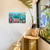 Springtime Hummingbirds Large LED Canvas Art with colorful hummingbirds and flowers on a white wall.