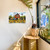Large LED canvas art of Sunflower Barn on a wall, showcasing red barn and sunflowers.