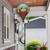 Camping Deluxe Hot Air Balloon Spinner with colorful design and camping theme on a house porch.