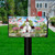 Church in Spring scene on a mailbox cover with white picket fence and colorful birds.