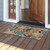 Scattered Shells coir doormat, 18x30, colorful coral and sea shell design on natural fiber background.