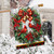 Cardinal Wreath House Flag with red cardinals, green leaves, and red poinsettias on white background.