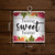 Farmhouse metal mini sign, 6x6 inches, white, with colorful flowers and "Home Sweet Home" text.