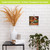 Autumn Farm Metal Mini Moment decorative wall art with tractor and fall scenery on white brick.