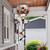 Snowman and Friends Hot Air Balloon Spinner with red, black and white swirls on a stand.