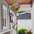 Deluxe Hummingbird Feeder Hot Air Balloon Spinner with colorful hummingbirds and pink accents on metal pole.