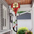 Christmas Poinsettias hot air balloon spinner outdoor decoration with red and green spiral tail.