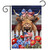 Patriotic Highland Cow Garden Flag with American flag flowers and bow on cow's head outdoors.