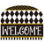 Checkerboard acrylic art sign with "WELCOME" in white on black background with gold accents.
