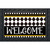 Black and white checkerboard doormat with Welcome text and yellow accents, decorative border.