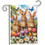 Bunny Greeting Garden Flag with three brown rabbits, colorful flowers, and butterflies on a wooden fence.