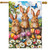 Bunny Greeting House Flag with three brown bunnies, colorful flowers, and butterflies on a garden background.