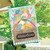 Colorful Easter Basket House Flag with eggs, chick, and Happy Easter sign on green background.