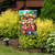 Springtime Chipmunks Garden Flag with colorful floral design and two chipmunks gardening together outdoors.