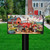 Farm Pups Mailbox Cover with colorful dogs, red truck, and flowers on a lawn post outdoors.