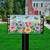 Busy Bees Mailbox Cover with colorful flowers, bees, and "Bee Joyful" text on a black mailbox.