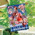 Cherry Blossom Cardinal House Flag with two cardinals and pink flowers on blue plaid background.