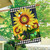 Blooming Sunflowers House Flag with yellow sunflowers, butterflies, and bees on black and white checkered background.