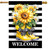 Yellow rain boots with black bow and sunflowers on black and white striped welcome house flag.