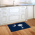 South Carolina Palm Tree Doormat with crescent moon and palm tree on blue background indoors.
