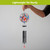 Cherry Blossom Cardinal Illuminated Wind Chime with colorful blossoms and black tubes and pink pendant.