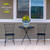 Blue and Gold Medium Planter on table between two black chairs on a patio setting.