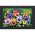 Colorful Pansy Trio Doormat with vibrant flowers, dragonfly, and butterfly design on a black background.