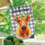 Checkered Highland Cow Burlap House Flag with floral crown and welcome text on gray background.