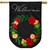 Black burlap house flag with floral wreath and Welcome text on wooden dowel rod holder.