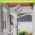Butterflies and Peonies Hot Air Balloon Spinner outdoor decoration with colorful butterflies and pink flowers.